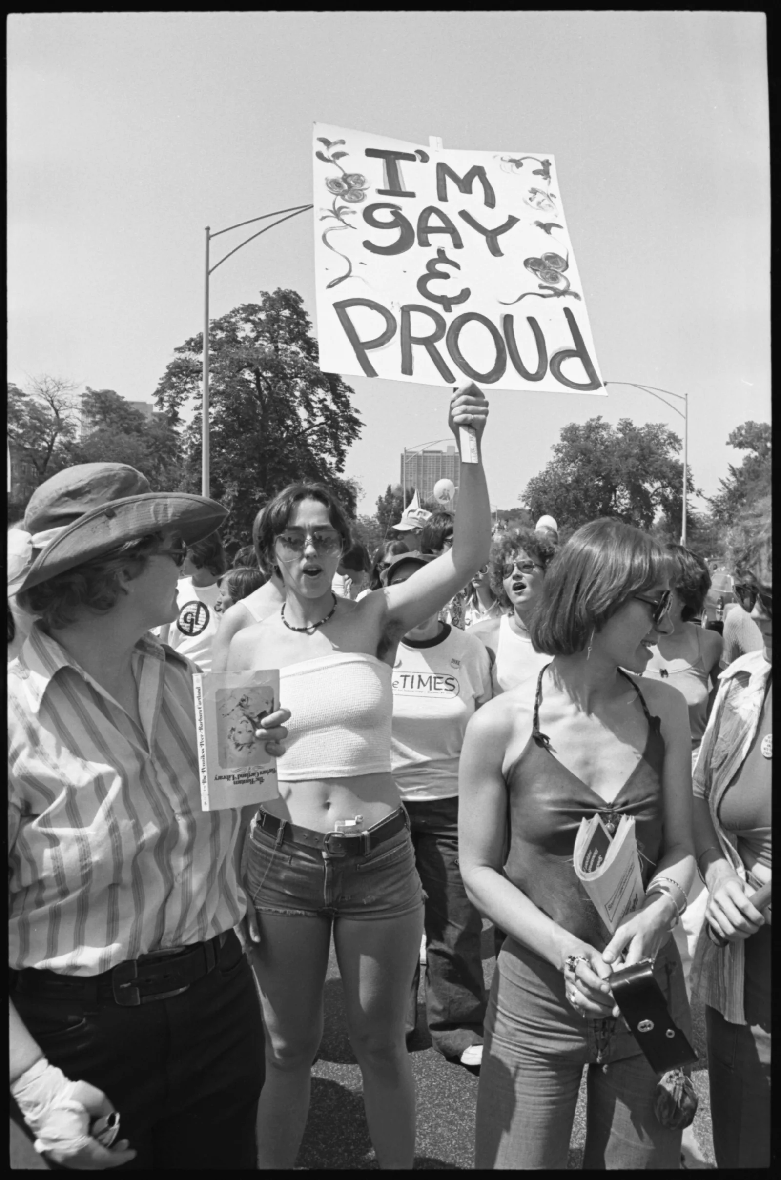 Midwest ms militante box 001 fl 002 010 A woman holds a sign that reads "I'm Gay and I'm Proud"
